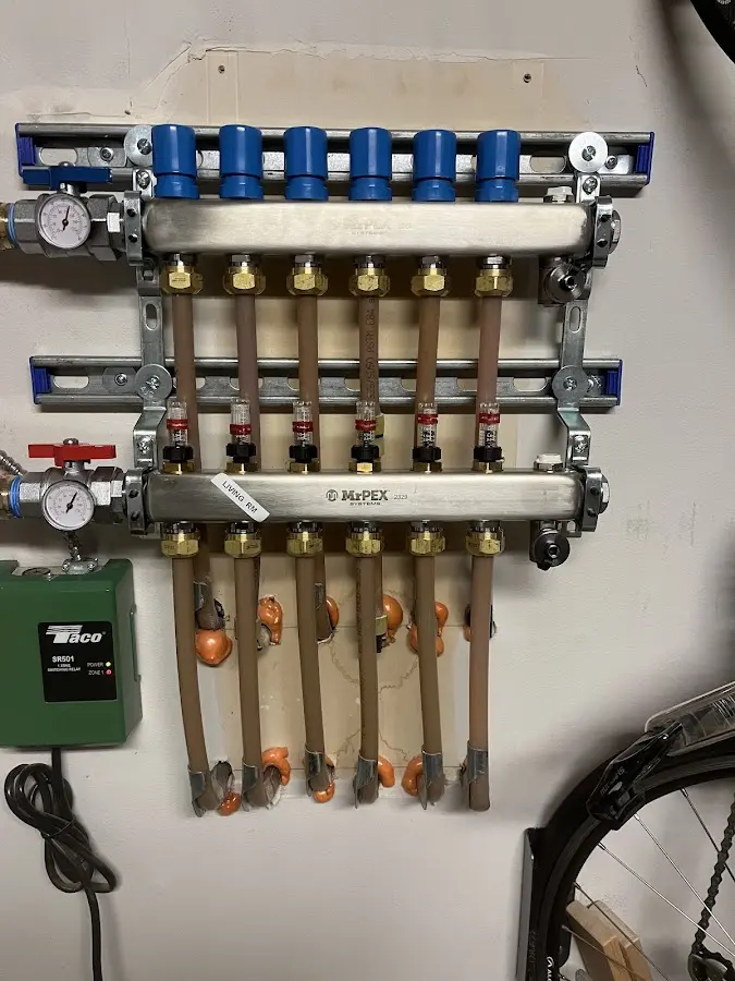 Plumber performing Water Heater Repair at a residential property in Colonial Beach